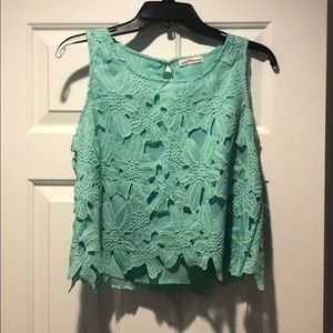 Green/bluish floral blouse